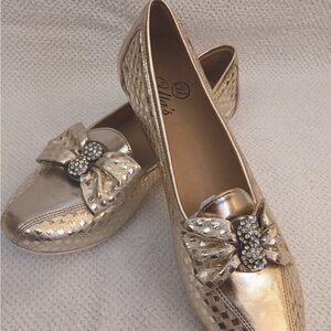 ULA’S Elegant Gold Flats with Bow Accent